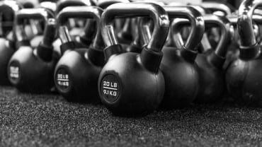 Lots of kettlebells on the floor.