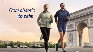 A man and a woman running outside with the words 'from chaotic to calm' next to them