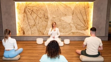 People in a David Lloyd Clubs sound meditation class