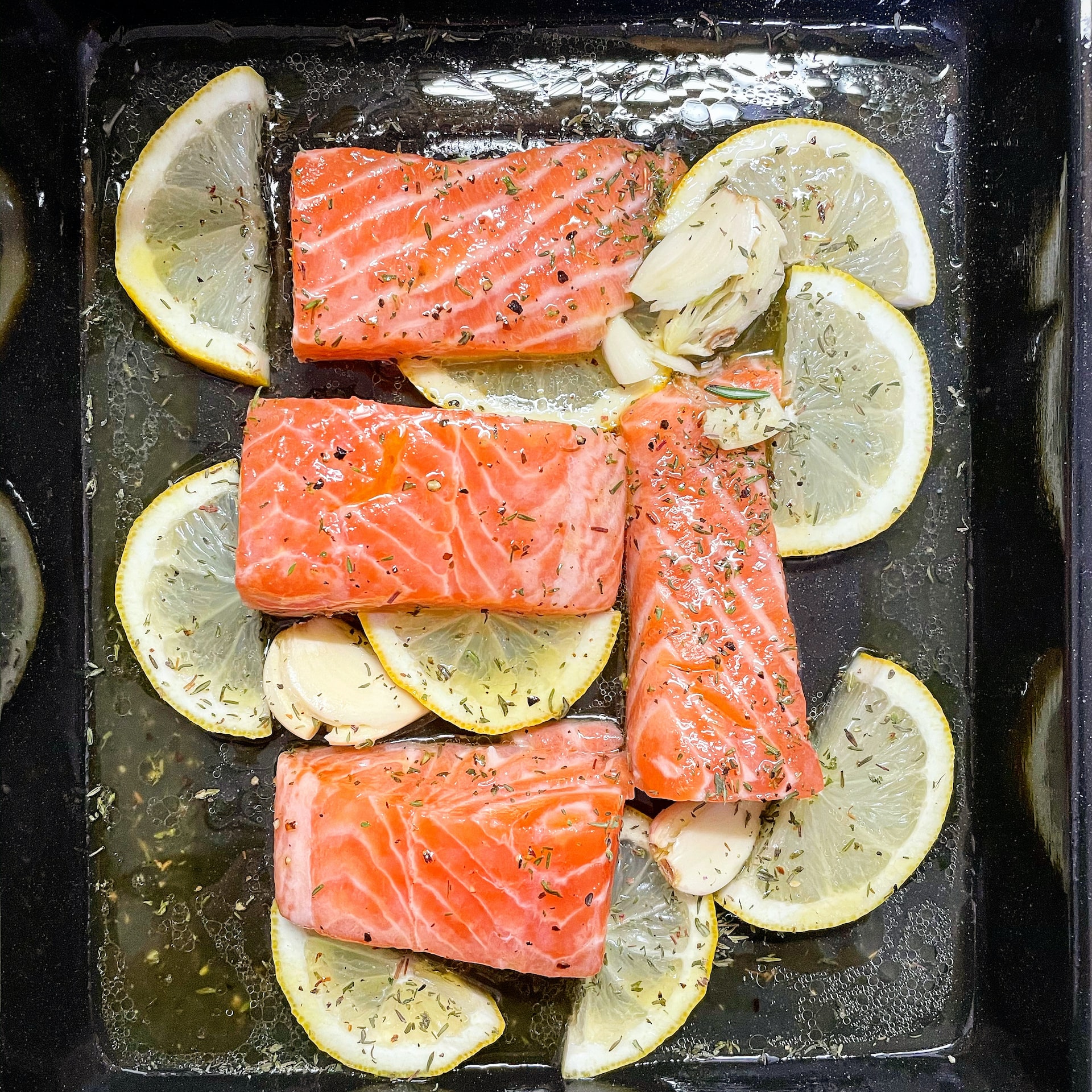 Salmon fillets in a baking tray