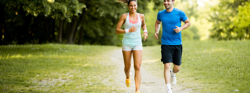 couple-running-in-park