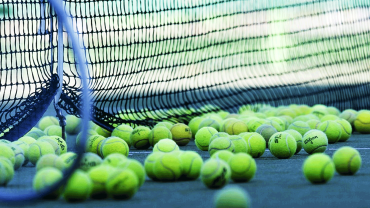 starting-tennis-balls-net