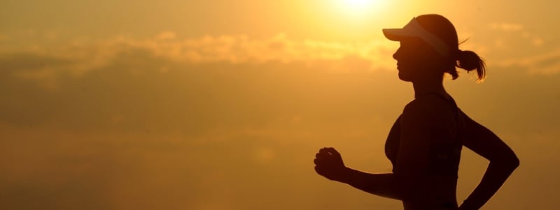 Silhouette of a runner at sunset