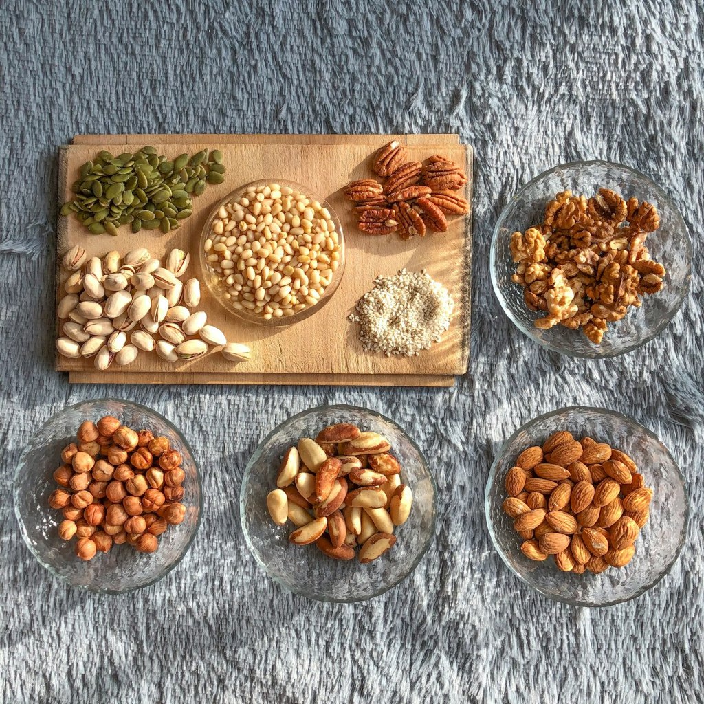 A flatlay of a selection of different types of nuts.