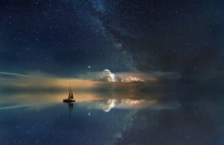 A boat against a night sky.