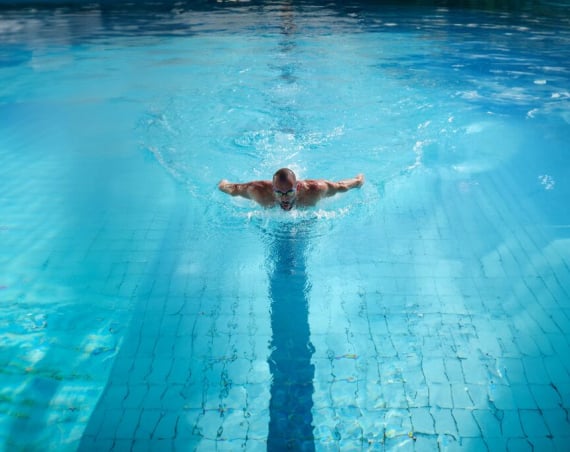 A man in a swimming pool.