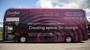 Driving for Change bus for Change Please x David Lloyd Clubs.